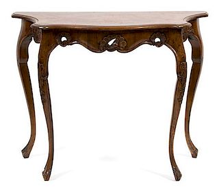 An Italian Louis XV Style Walnut Console Table Height 29 1/2 x width 37 3/4 x depth 16 inches.