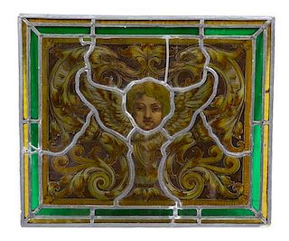 Four French Stained and Leaded Glass Panels Height of largest 21 1/8 x width 17 5/8 inches.