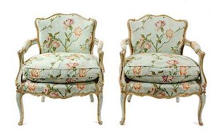 A Pair of Louis XV Style Painted and Giltwood Fauteuils Height 29 x width 25 x depth 24 inches.