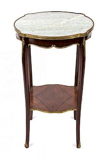 A Pair of Louis XV Style Gilt and Marble Top Gueridons Height 27 1/2 x diameter 17 inches.