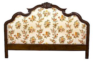 A Louis XV Style Carved Mahogany Upholstered Head Board Height 53 x width 79 inches.