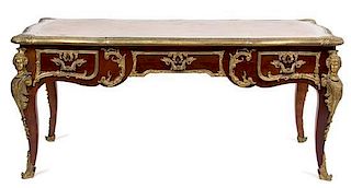 A Louis XV Style Gilt Bronze Bureau Plat Desk Height 31 1/2 x width 69 x depth 38 inches.