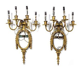 A Pair of Louis XVI Style Gilt Bronze and Beaded Crystal Four-Light Wall Sconces Height 27 1/2 inches.