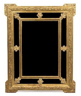 A Louis XVI Style Giltwood Double Framed Mirror 40 x 50 3/4 inches.