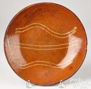 Pennsylvania redware plate, 19th c.