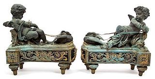 A Pair of Louis XVI Style Bronzed Metal Chenets Height 15 inches.