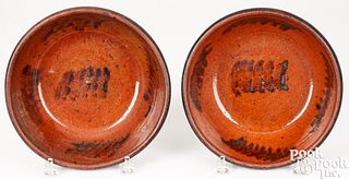 Pair of Pennsylvania redware bowls, 19th c.