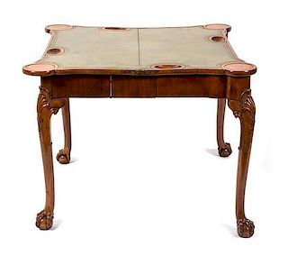 A George I Style Walnut Flip Top Game Table Height 27 x width (open) 35 1/4 x depth 34 3/4 inches.