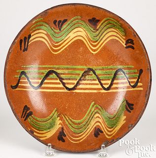 Redware charger, 19th c.