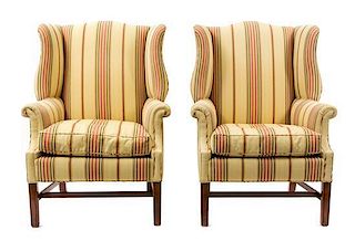 A Pair of George I Style Mahogany Wing Chairs Height 40 1/2 x width 26 1/2 x depth 33 inches.