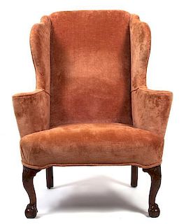 A George I Style Walnut Framed Upholstered Wing Chair Height 46 inches.