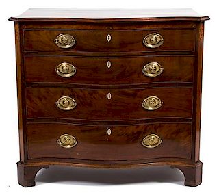 A George II Inlaid Mahogany Serpentine Chest of Drawers Height 33 3/4 x width 37 1/2 x depth 19 3/4 inches.