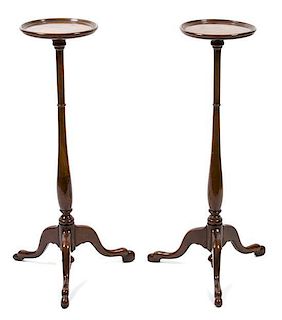 A Pair of George III Style Mahogany Tripod Candlestands Height 34 1/2 inches.