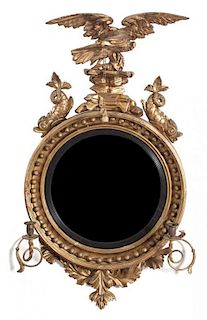 An English Regency Convex Mirror Height 48 x 26 inches.