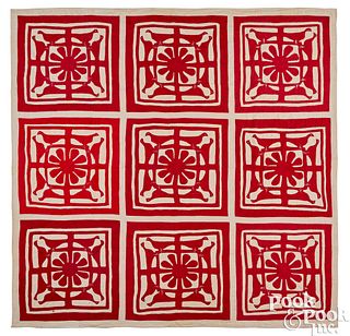 Unusual red and white appliqué bird quilt