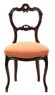 A Victorian Carved Mahogany Side Chair Height 35 1/2 inches.