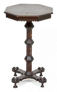 An American Stained Pine Occasional Table Height 28 1/2 x diameter 18 3/4 inches.