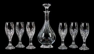 A Seven-Piece Baccarat Glass Cordial Set Height of decanter 9 1/4 inches.