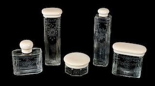 A Group of Five Etched and Cut Glass Dresser Set Height of tallest 5 inches.