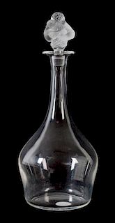 A Lalique Molded and Frosted Glass Decanter Height 12 3/4 inches.