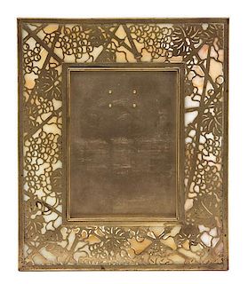 A Tiffany Studios Gilt Bronze Picture Frame 9 1/8 x 7 1/8 inches.