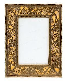A Tiffany Studios Gilt Bronze Picture Frame 11 5/8 x 8 7/8 inches.