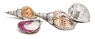 A Group of Four Silver Plated Shells Length of longest 11 3/4 inches.