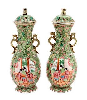 A Pair of Chinese Export Rose Famille Verte Vases with Covers Height 13 1/2 inches.