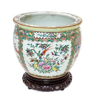 A Chinese Export Rose Canton Porcelain Jardiniere Height 10 1/4 inches.
