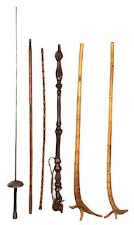 A Collection of Vintage Parasols, Fencing Foils and Walking Sticks Length of longest 44 inches.