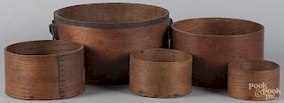 Six Massachusetts graduated bentwood pantry boxes with iron strapping, stamped Farrar Royalston