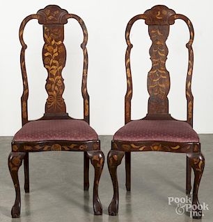 Pair of Dutch marquetry inlaid dining chairs, late 19th c.