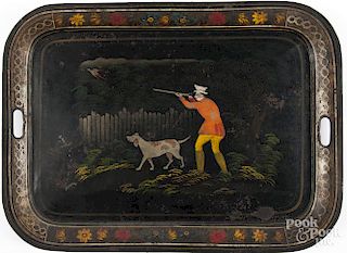 Tole decorated tray, 19th c., with a stenciled scene of a hunter and dog, 20 1/2'' l., 27 3/4'' w.