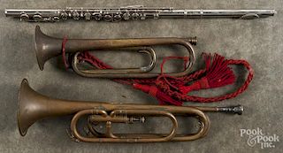 Three musical instruments, to include a Bundy flute by Selmer, a Ludwig trumpet bugle