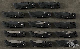 Fourteen Boker pocket knives.