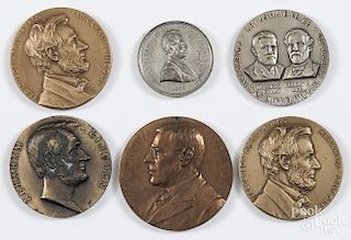 Four Abraham Lincoln medals, including two by Medallic Art Co., NY, 2 1/8'' dia.