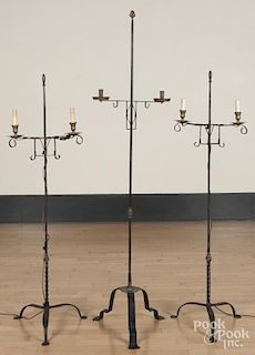 Three reproduction wrought iron candlestands, tallest - 69 1/4''.