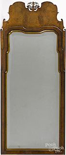 Queen Anne style burl veneer looking glass, by Thompson, 40 1/4'' x 17''.