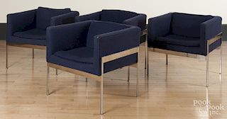 Four upholstered chairs with stainless steel bases, probably Knoll.