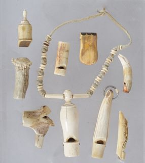 A Group of Bone and Antler Antique Whistles