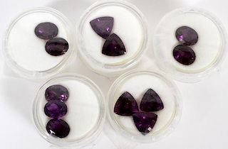 12 AMETHYST STONES UNCUT  VARIOUS SHAPES AND SIZES