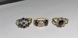 Three 14K gold genuine blue sapphire and diamond rings