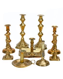 Group of Nine Brass Candlesticks.