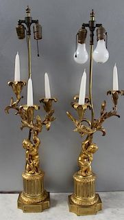 Pair of 19th C Dore Bronze Putti Form Candlebra.