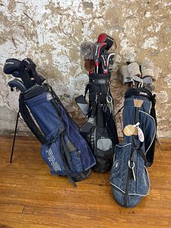 Three Sets of Golf Clubs