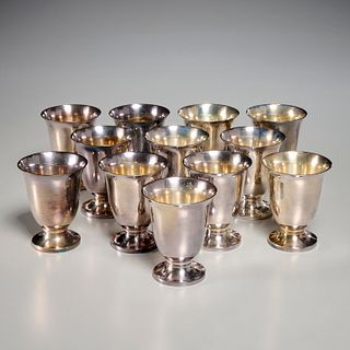 Set (12) sterling silver dram cups
