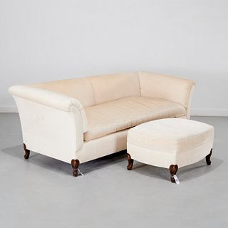 Custom cream upholstered sofa and ottoman