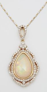 14K Yellow Gold Pendant, with an 8.06 carat pear-s