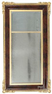 Empire mahogany and giltwood mirror, mid 19th c., 53'' x 27 1/4''.