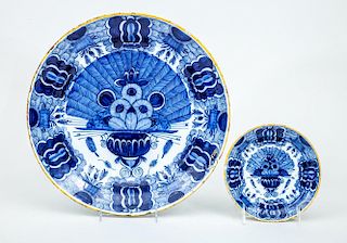 TWO DUTCH BLUE AND WHITE DELFT PEACOCK PLATES
